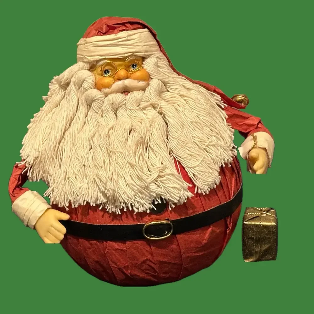 Delightful round Santa made with paper. Very cute!